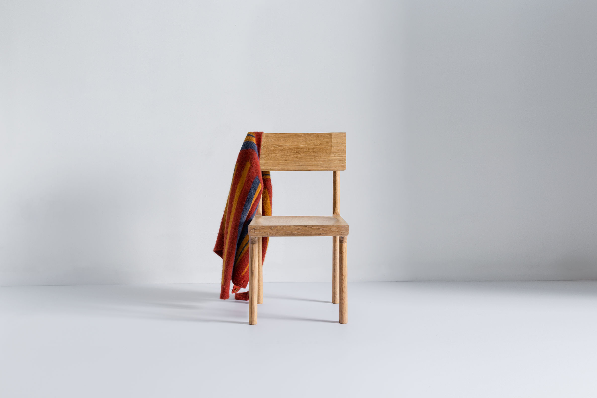Close-up of wood grain on chair backrest